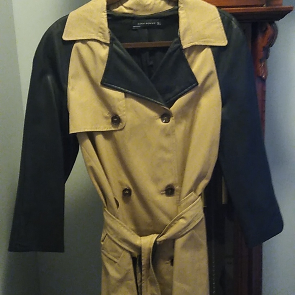London fog type coat with with  leather looking sleeves and collar.